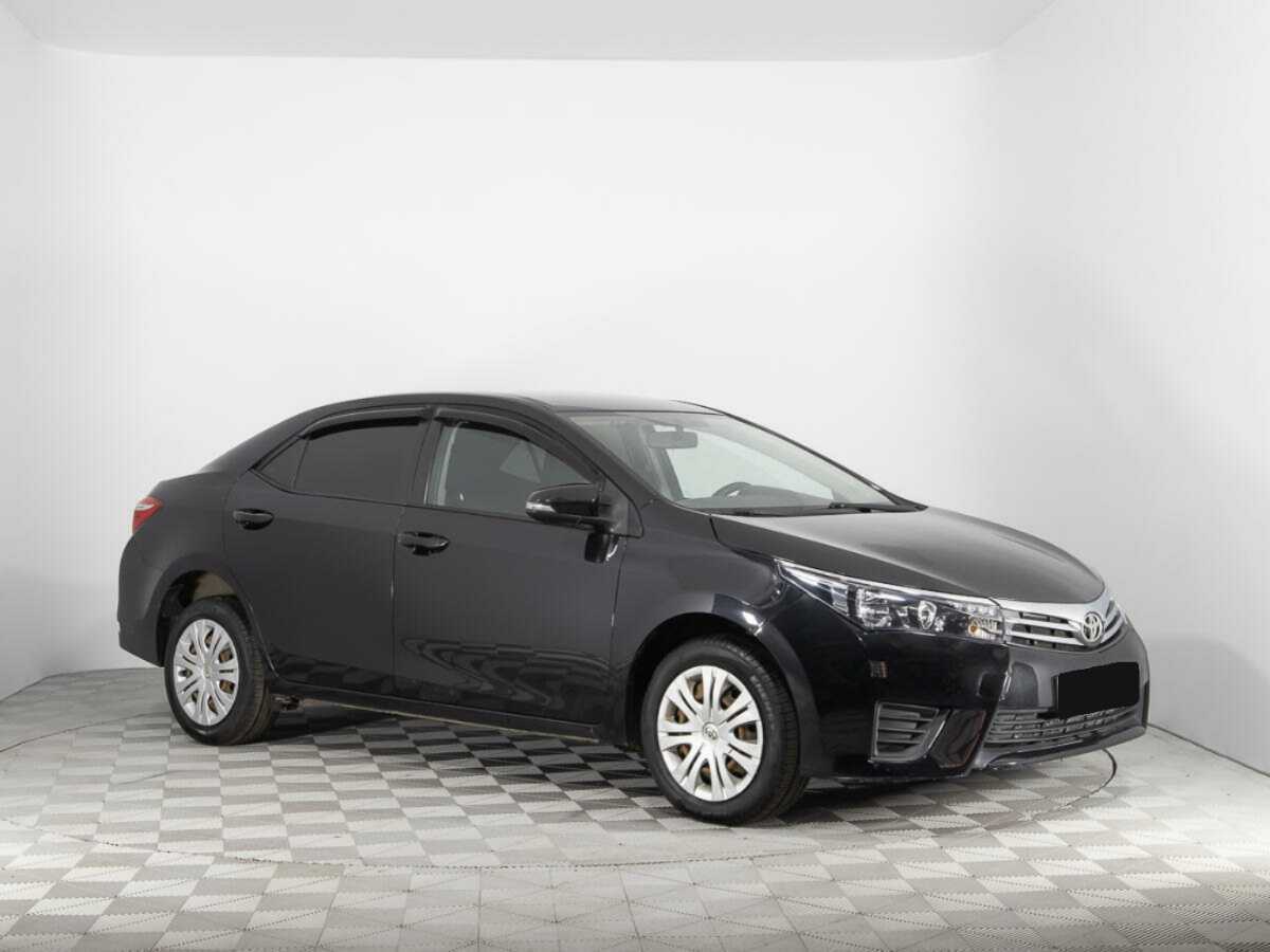 Toyota Corolla 2014 года с пробегом. Фото: #2