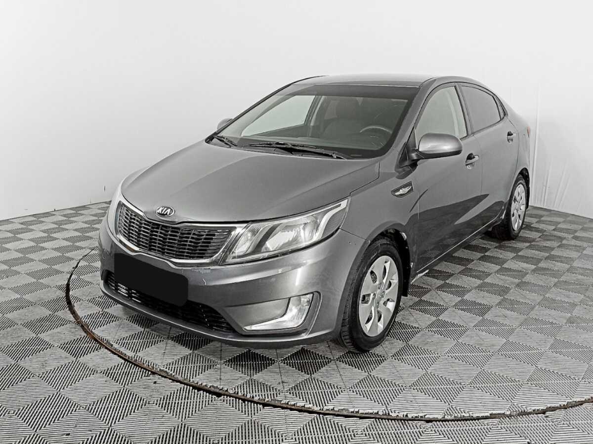 Kia Rio 2013 года с пробегом. Посмотреть фото