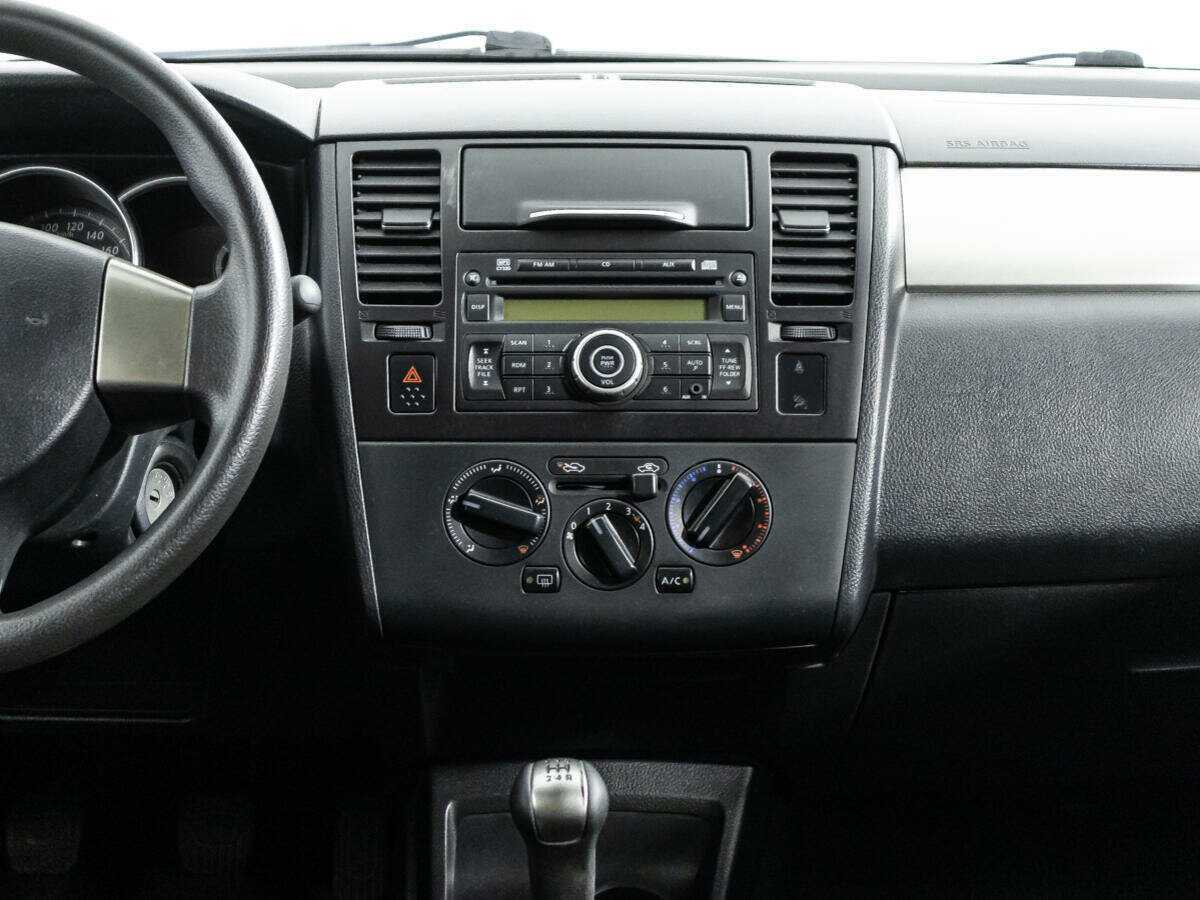 Nissan Tiida 2013 года с пробегом. Фото: #13
