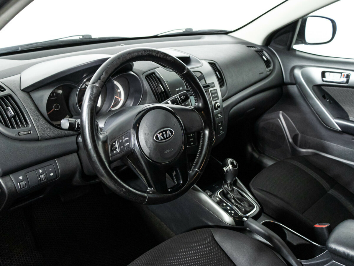 Kia Cerato 2012 года с пробегом. Фото: #10