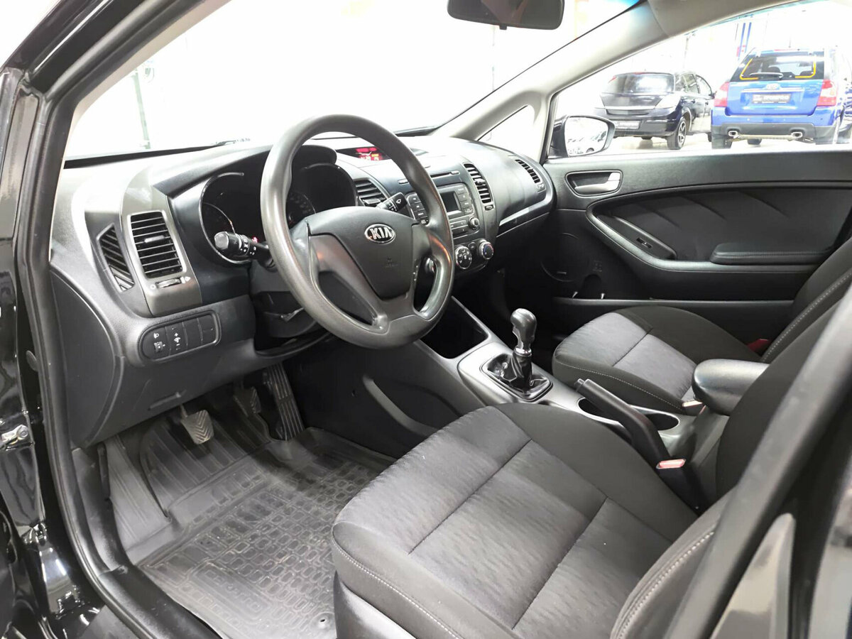 Kia Cerato 2013 года с пробегом. Фото: #15