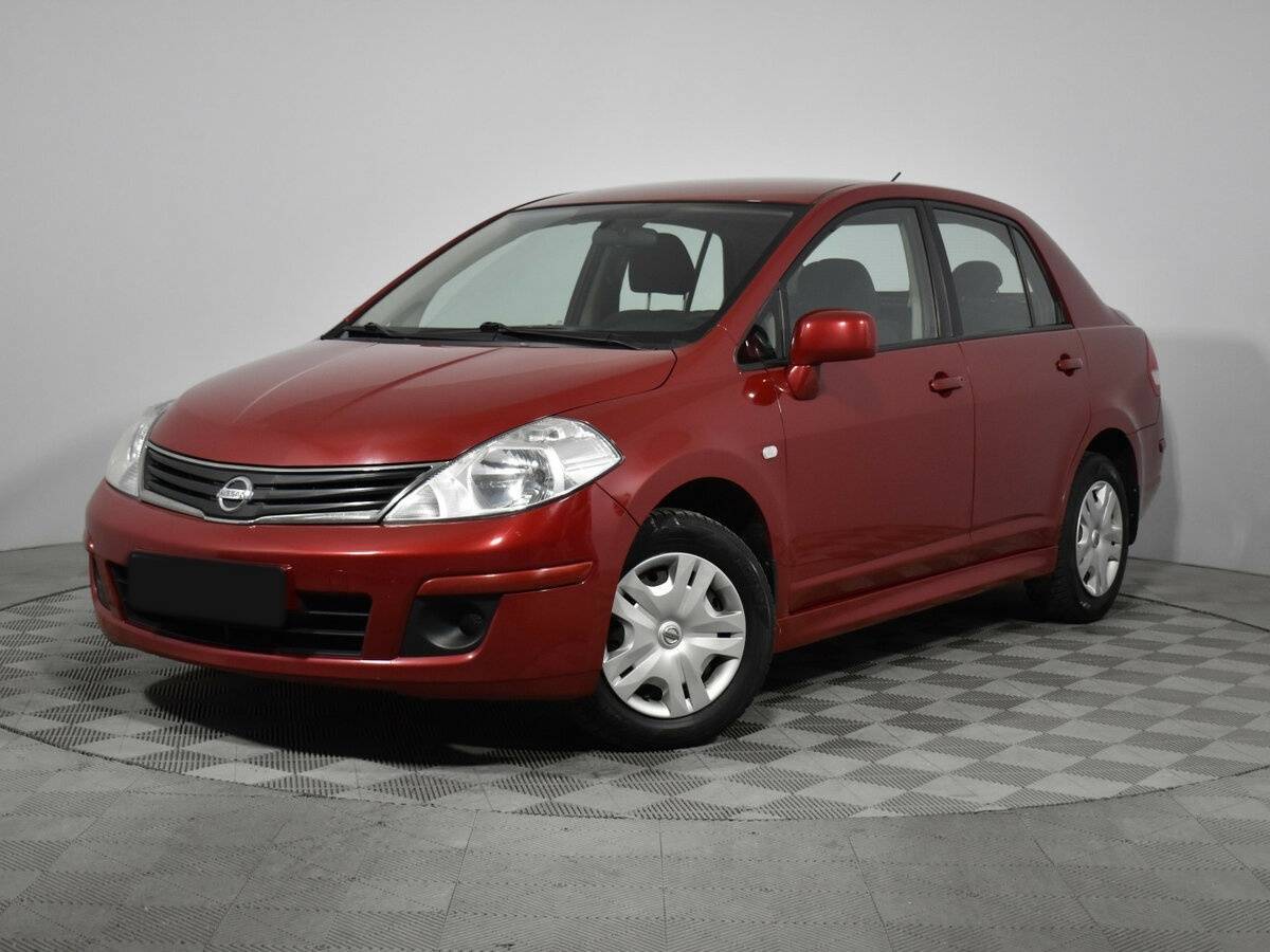 Nissan Tiida 2012 года с пробегом. Посмотреть фото