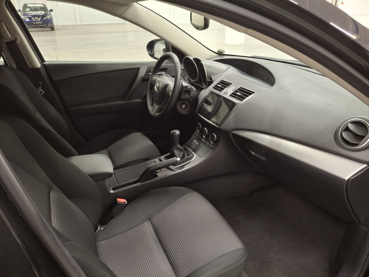 Mazda 3 2013 года с пробегом. Фото: #10