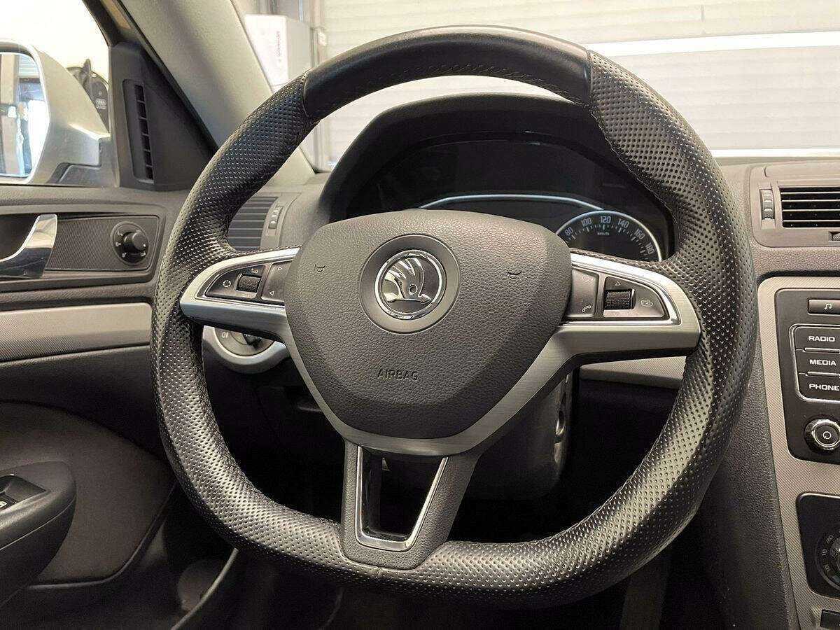 Skoda Octavia 2012 года с пробегом. Фото: #13