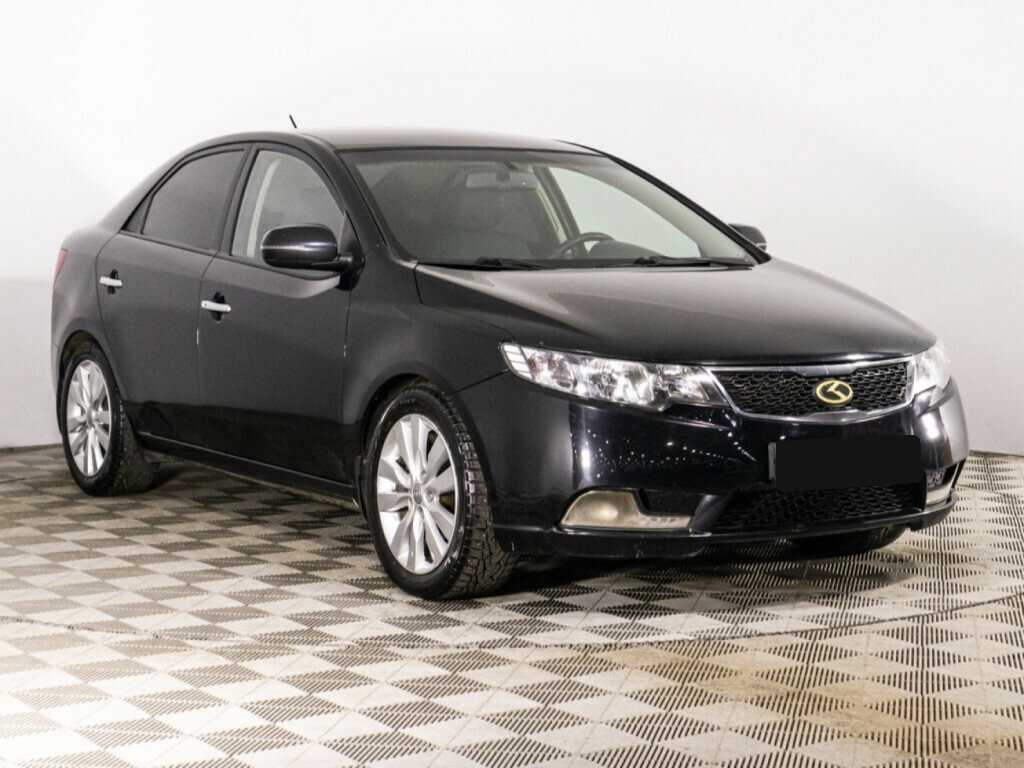 Kia Cerato 2012 года с пробегом. Фото: #2