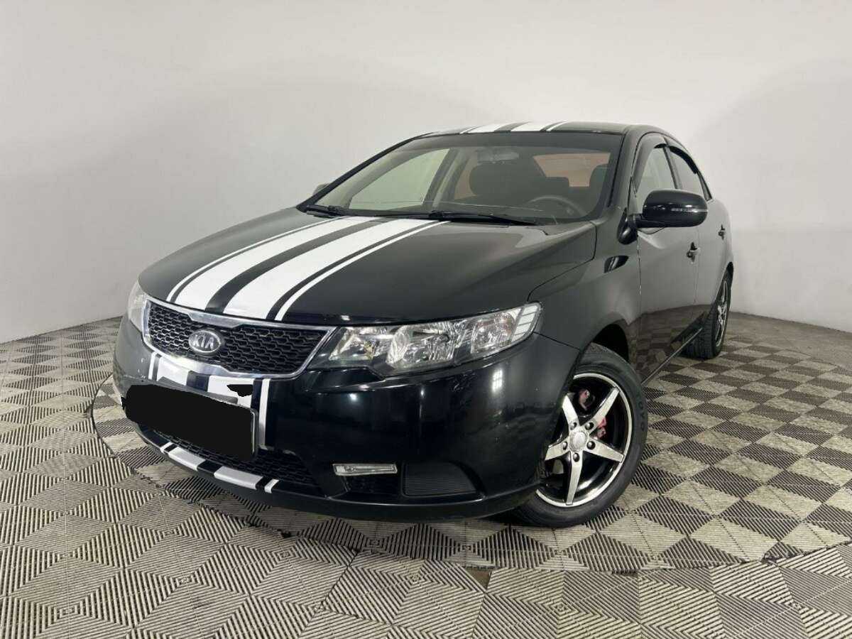Kia Cerato 2013 года с пробегом. Посмотреть фото