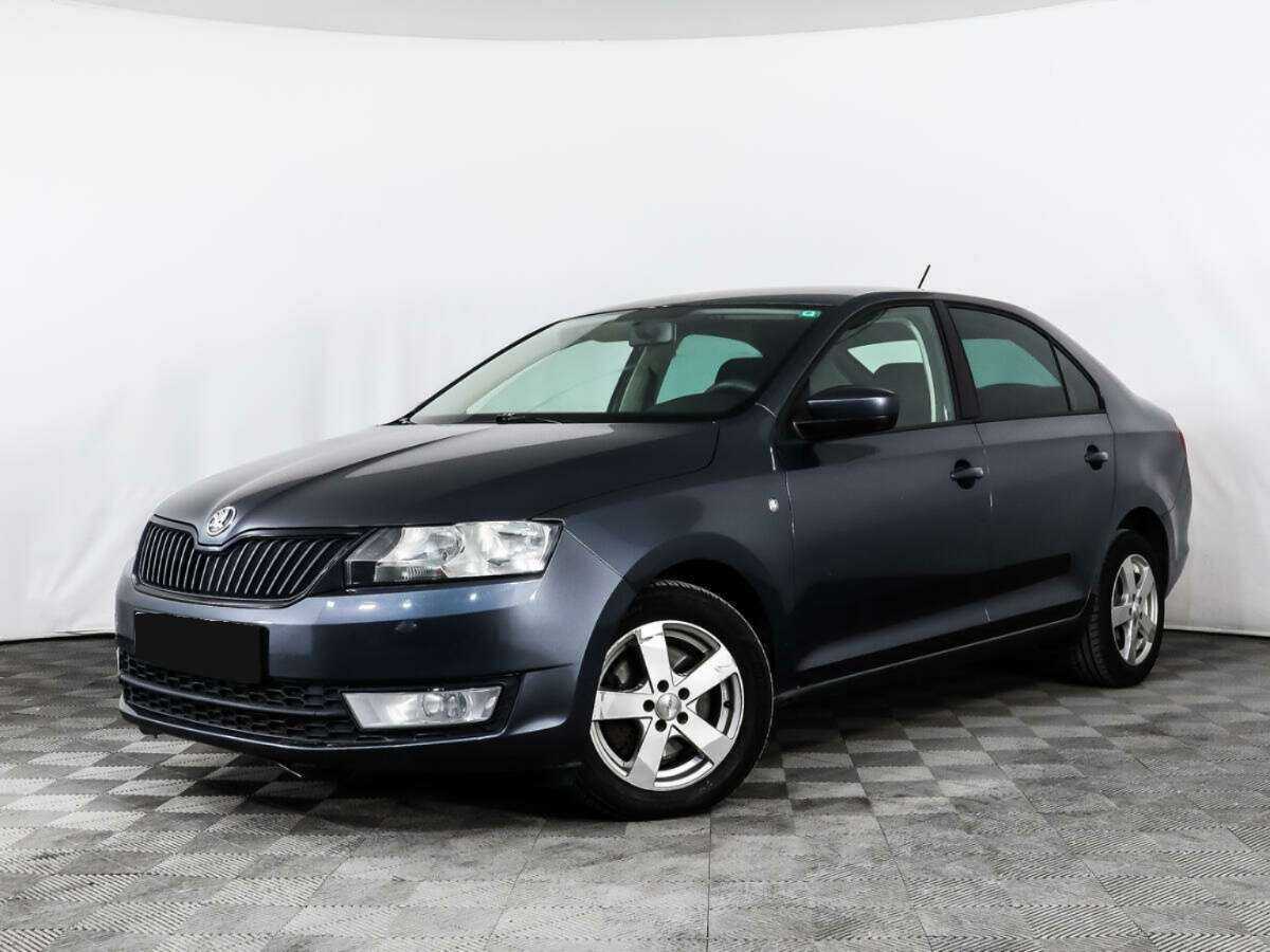 Skoda Rapid 2014 года с пробегом. Посмотреть фото