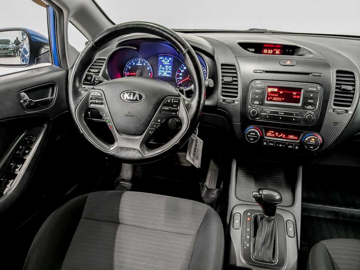 Kia Cerato 2013 года с пробегом. Фото: #24
