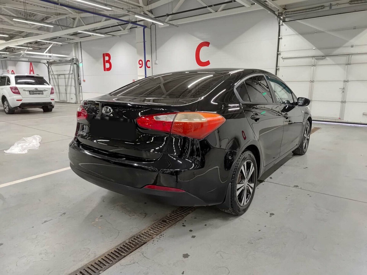 Kia Cerato 2013 года с пробегом. Фото: #4