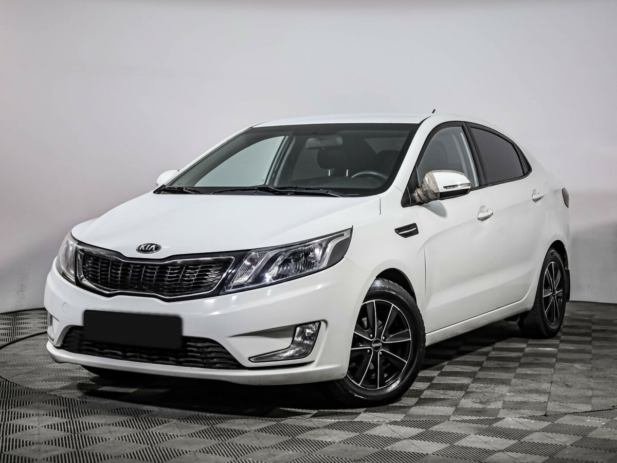Kia Rio 2013 года с пробегом. Посмотреть фото