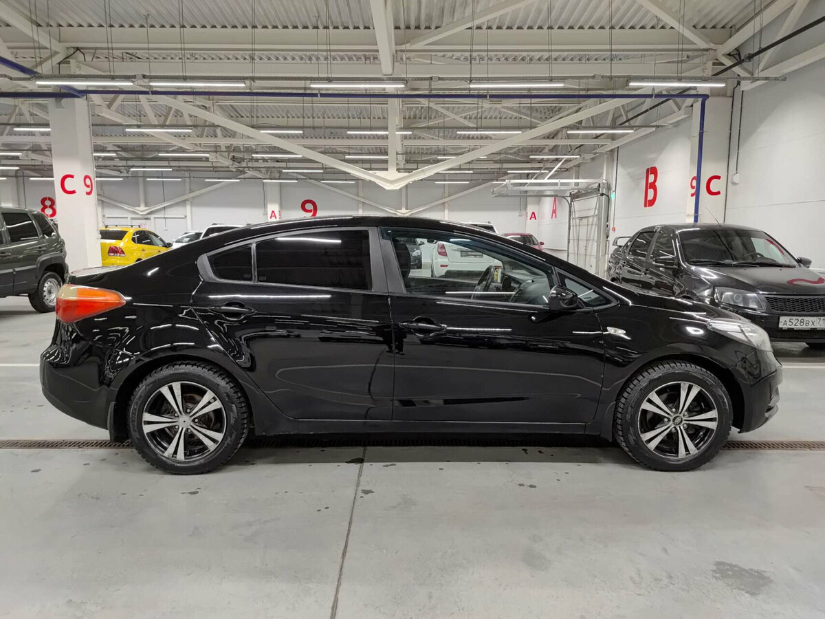 Kia Cerato 2013 года с пробегом. Фото: #3