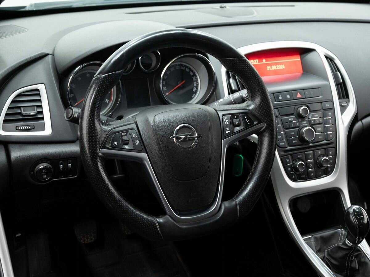 Opel Astra 2013 года с пробегом. Фото: #12