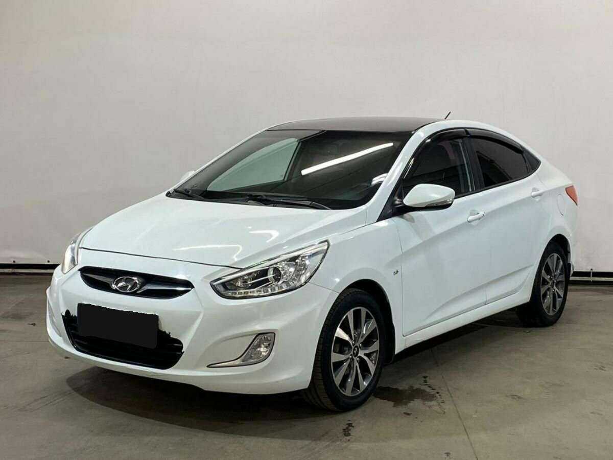 Hyundai Solaris 2013 года с пробегом. Посмотреть фото