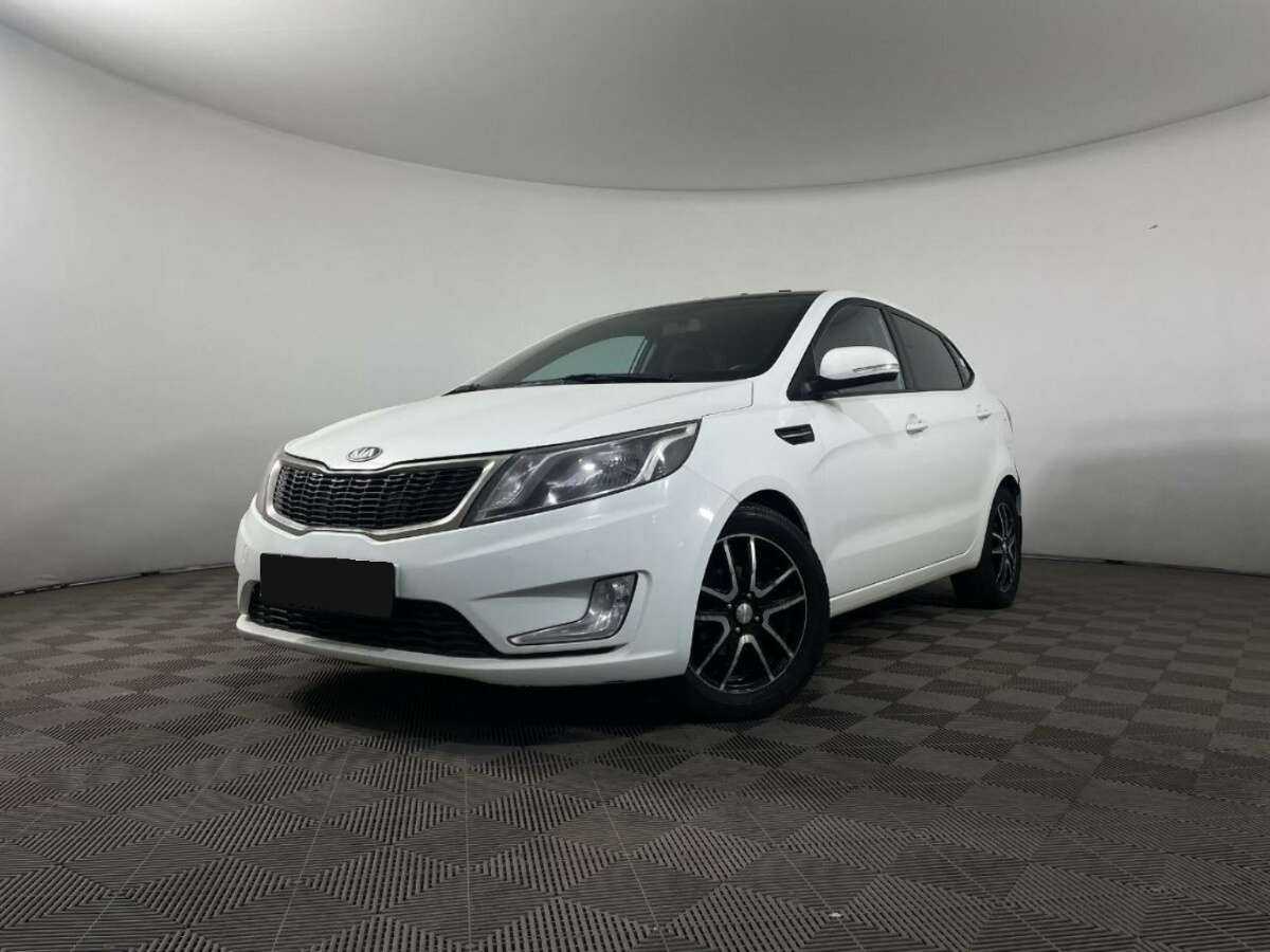 Kia Rio 2013 года с пробегом. Посмотреть фото
