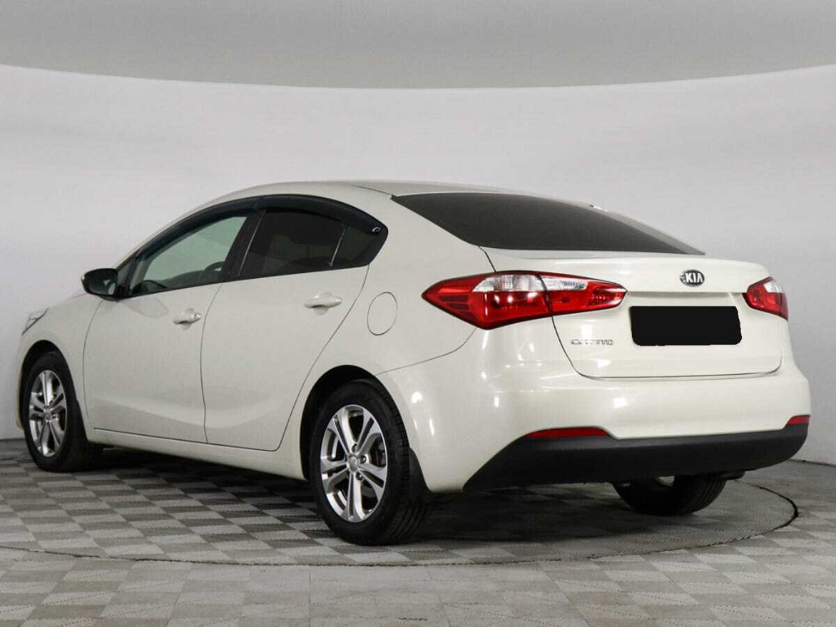 Kia Cerato 2013 года с пробегом. Фото: #6