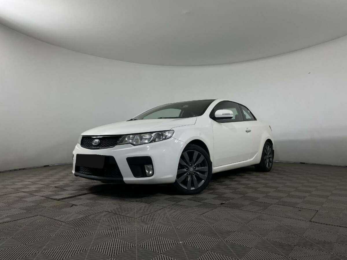 Kia Cerato 2012 года с пробегом. Посмотреть фото